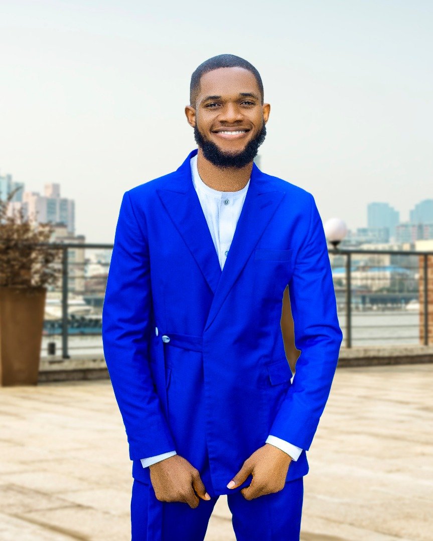 James Onwuchekwa in Blue Suit